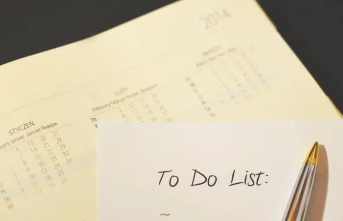 A calendar and handwritten to-do list on a desk — Portugal Startup Visa residence permit validity