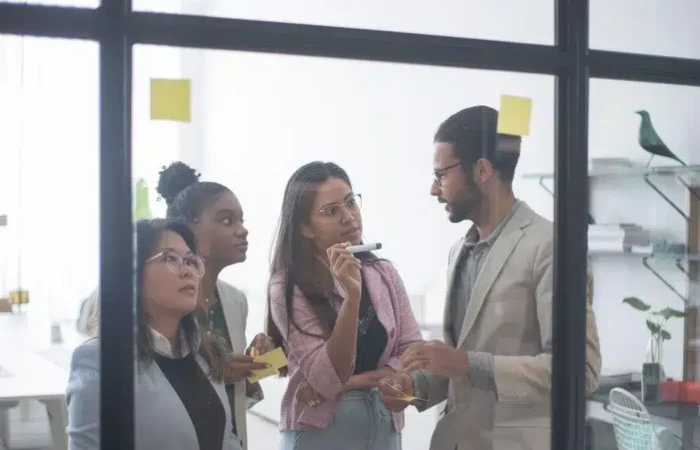 A diverse business team collaborating during a meeting in Portugal — Portugal Startup Visa multiple founders