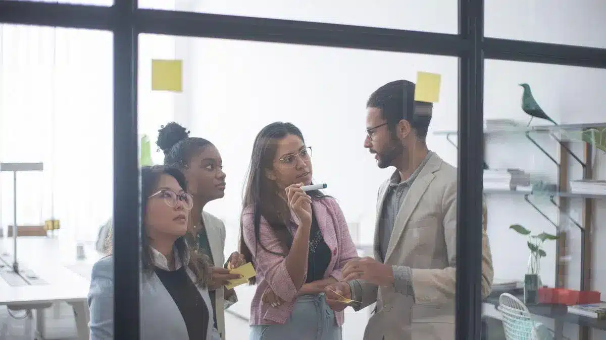A diverse business team collaborating during a meeting in Portugal — Portugal Startup Visa multiple founders